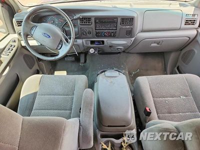 Zdjęcie 8 z 12 samochodu: 2003 FORD EXCURSION XLT VIN:1FMNU41S33EA15774 - miniatura