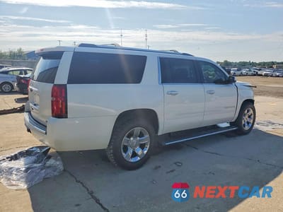 Trzecie zdjęcie samochodu z tyłu: 2017 CHEVROLET SUBURBAN K1500 PREMIER VIN:1GNSKJKC1HR380030 - miniatura