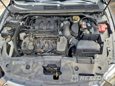 Zdjęcie 11 z 13 samochodu: 2015 FORD TAURUS SEL VIN:1FAHP2H89FG113567 - miniatura