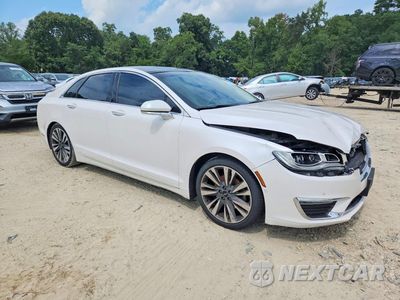 Czwarte zdjęcie samochodu z boku: 2017 LINCOLN MKZ RESERVE VIN:3LN6L5F92HR601082 - miniatura