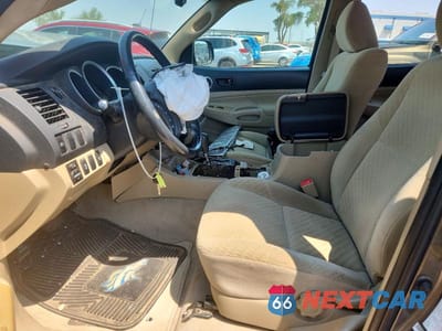 Zdjęcie 7 z 12 samochodu: 2009 TOYOTA TACOMA V6 VIN:3TMLU42N39M027768 - miniatura