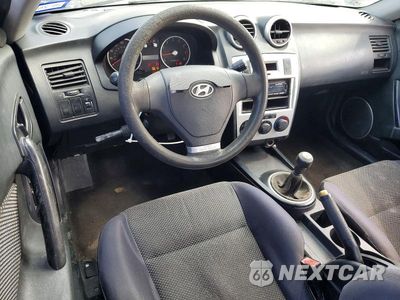 Zdjęcie 8 z 12 samochodu: 2006 HYUNDAI TIBURON GS VIN:KMHHM65D46U210961 - miniatura