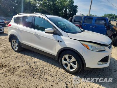 Czwarte zdjęcie samochodu z boku: 2014 FORD ESCAPE SE VIN:1FMCU9G93EUC40892 - miniatura