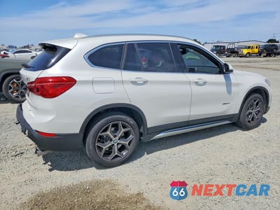 Trzecie zdjęcie samochodu z tyłu: 2018 BMW X1 SDRIVE28I VIN:WBXHU7C39J5H44602 - miniatura
