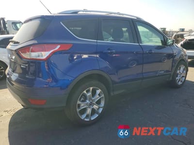 Trzecie zdjęcie samochodu z tyłu: 2014 FORD ESCAPE TITANIUM VIN:1FMCU9J98EUB09191 - miniatura