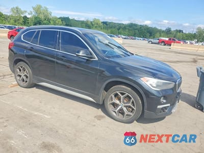 Czwarte zdjęcie samochodu z boku: 2018 BMW X1 XDRIVE28I VIN:WBXHT3C34J5L32323 - miniatura