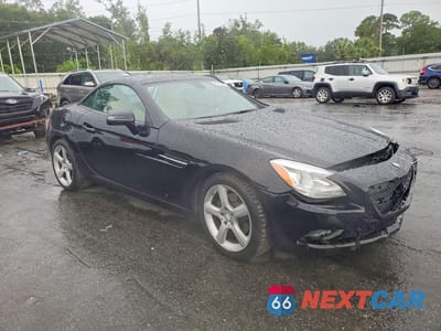 Czwarte zdjęcie samochodu z boku: 2012 MERCEDES-BENZ SLK 250 VIN:WDDPK4HA8CF048219 - miniatura