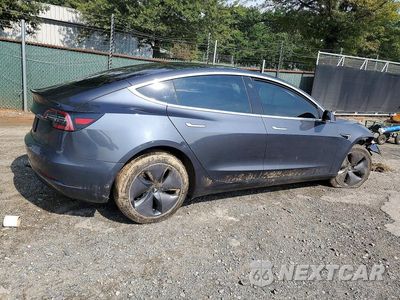 Trzecie zdjęcie samochodu z tyłu: 2019 TESLA MODEL 3 VIN:5YJ3E1EAXKF434694 - miniatura