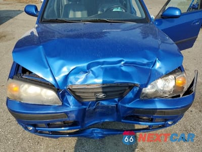Zdjęcie 12 z 13 samochodu: 2005 HYUNDAI ELANTRA GLS VIN:KMHDN56D45U136203 - miniatura