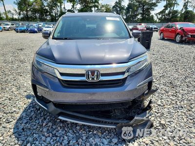 Piąte zdjęcie samochodu w środku: 2019 HONDA PILOT TOURING VIN:5FNYF5H61KB034170 - miniatura