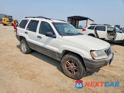 Czwarte zdjęcie samochodu z boku: 2003 JEEP GRAND CHEROKEE LAREDO VIN:1J4GW48S23C617407 - miniatura