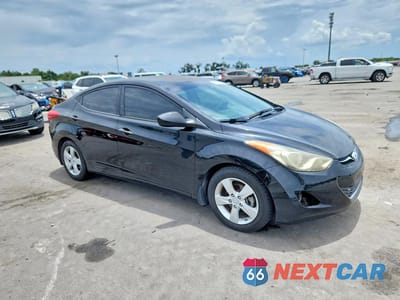 Czwarte zdjęcie samochodu z boku: 2013 HYUNDAI ELANTRA GLS VIN:5NPDH4AE9DH235985 - miniatura