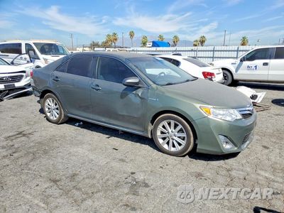 Czwarte zdjęcie samochodu z boku: 2014 TOYOTA CAMRY HYBRID XLE VIN:4T1BD1FK7EU126430 - miniatura