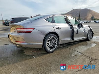 Trzecie zdjęcie samochodu z tyłu: 2023 GENESIS ELECTRIFIED G80 BASE VIN:KMTGE4S1XPU004719 - miniatura