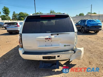 Zdjęcie 6 z 14 samochodu: 2012 GMC YUKON DENALI HYBRID VIN:1GKS2GEJ3CR222808 - miniatura