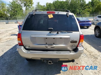 Zdjęcie 6 z 14 samochodu: 1999 JEEP GRAND CHEROKEE LIMITED VIN:1J4GW68N5XC547087 - miniatura