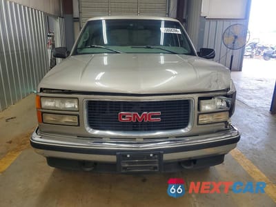 Piąte zdjęcie samochodu w środku: 1999 GMC SUBURBAN K1500 VIN:3GKFK16R0XG514909 - miniatura