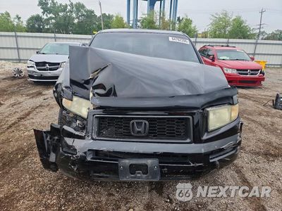 Piąte zdjęcie samochodu w środku: 2007 HONDA RIDGELINE RTX VIN:2HJYK16377H509492 - miniatura
