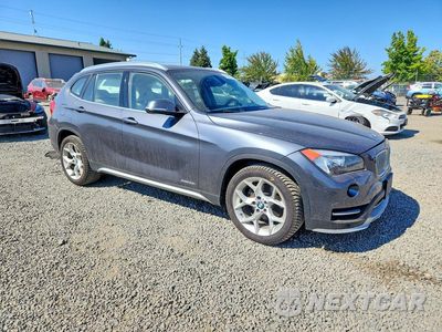 Czwarte zdjęcie samochodu z boku: 2015 BMW X1 XDRIVE28I VIN:WBAVL1C56FVY31828 - miniatura