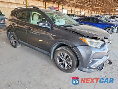 Czwarte zdjęcie samochodu z boku: 2018 TOYOTA RAV4 HYBRID XLE VIN:JTMRJREVXJD177839 - miniatura
