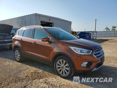 Czwarte zdjęcie samochodu z boku: 2017 FORD ESCAPE TITANIUM VIN:1FMCU9J93HUE21486 - miniatura