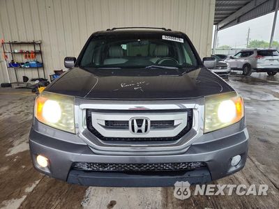 Piąte zdjęcie samochodu w środku: 2010 HONDA PILOT TOURING VIN:5FNYF4H94AB008326 - miniatura