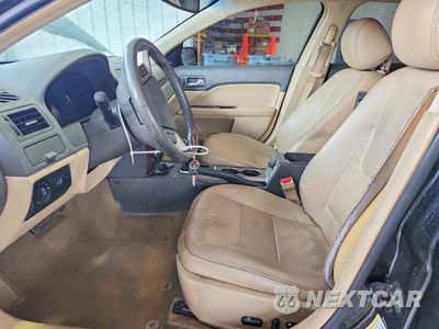Zdjęcie 7 z 12 samochodu: 2012 FORD FUSION SEL VIN:3FAHP0JG7CR443640 - miniatura