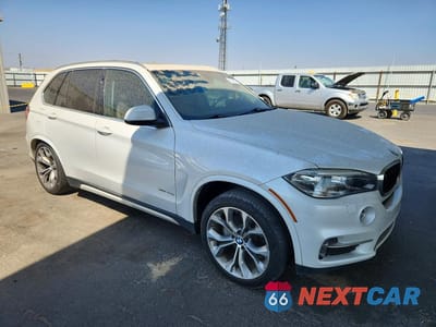 Czwarte zdjęcie samochodu z boku: 2016 BMW X5 XDR40E VIN:5UXKT0C57G0S79222 - miniatura