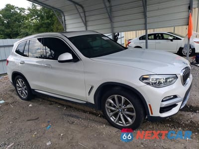 Czwarte zdjęcie samochodu z boku: 2019 BMW X3 SDRIVE30I VIN:5UXTR7C51KLF25848 - miniatura