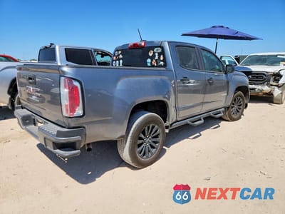 Trzecie zdjęcie samochodu z tyłu: 2021 GMC CANYON ELEVATION VIN:1GTG5BEA2M1244388 - miniatura