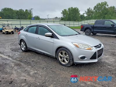 Czwarte zdjęcie samochodu z boku: 2014 FORD FOCUS SE VIN:1FADP3F25EL239143 - miniatura