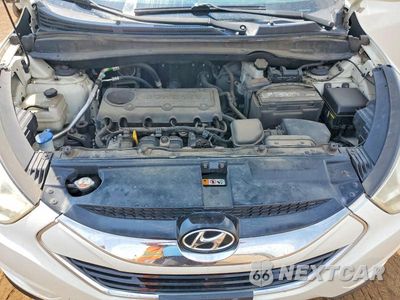 Zdjęcie 12 z 13 samochodu: 2013 HYUNDAI TUCSON LIMITED VIN:KM8JUCAC2DU563676 - miniatura