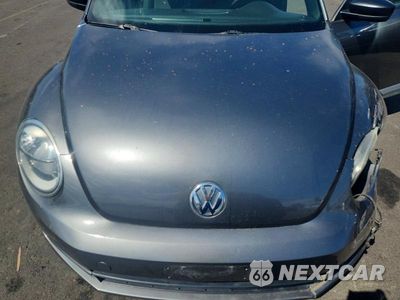 Zdjęcie 11 z 12 samochodu: 2014 VOLKSWAGEN BEETLE VIN:3VWF17AT6EM634388 - miniatura