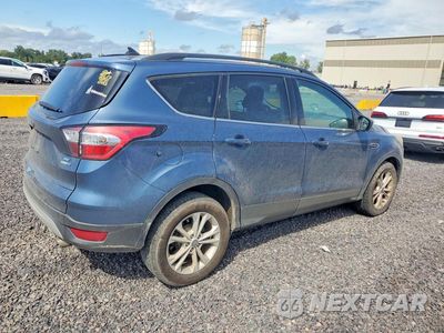 Trzecie zdjęcie samochodu z tyłu: 2018 FORD ESCAPE SE VIN:1FMCU9GD8JUA27029 - miniatura
