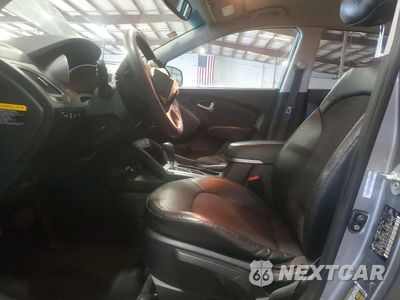 Zdjęcie 7 z 13 samochodu: 2013 HYUNDAI TUCSON GLS VIN:KM8JUCAC2DU784307 - miniatura