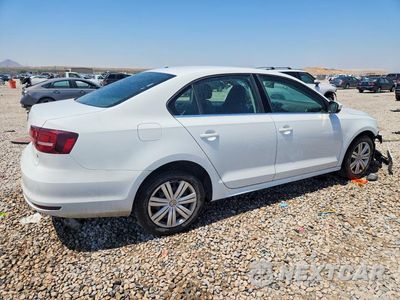 Trzecie zdjęcie samochodu z tyłu: 2017 VOLKSWAGEN JETTA S VIN:3VW2B7AJ3HM313021 - miniatura