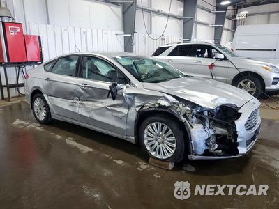 Czwarte zdjęcie samochodu z boku: 2016 FORD FUSION SE HYBRID VIN:3FA6P0LU5GR385558 - miniatura