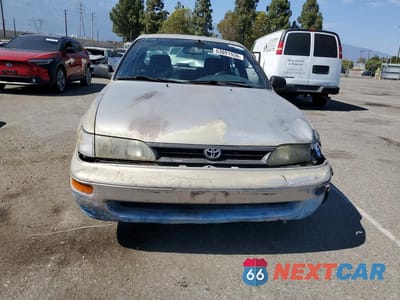 Piąte zdjęcie samochodu w środku: 1994 TOYOTA COROLLA DX VIN:1NXAE09B5RZ219032 - miniatura