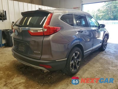 Trzecie zdjęcie samochodu z tyłu: 2018 HONDA CR-V TOURING VIN:7FARW1H98JE011396 - miniatura