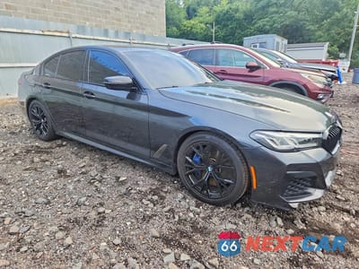 Czwarte zdjęcie samochodu z boku: 2021 BMW M550XI VIN:WBA13BK00MCG24129 - miniatura