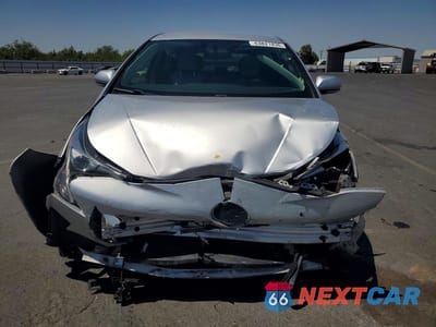 Piąte zdjęcie samochodu w środku: 2016 TOYOTA PRIUS TWO ECO VIN:JTDKARFU3G3500246 - miniatura