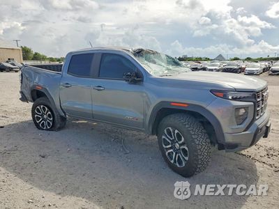 Czwarte zdjęcie samochodu z boku: 2024 GMC CANYON AT4 VIN:1GTP6DEK7R1297273 - miniatura