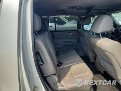 Zdjęcie 10 z 12 samochodu: 2014 HONDA PILOT TOURING VIN:5FNYF3H91EB025584 - miniatura