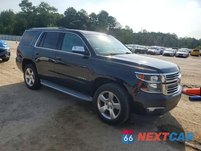 Czwarte zdjęcie samochodu z boku: 2015 CHEVROLET TAHOE C1500 LTZ VIN:1GNSCCKC0FR257180 - miniatura