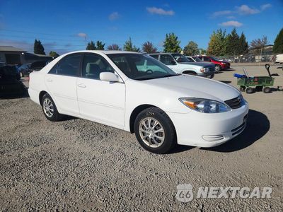 Czwarte zdjęcie samochodu z boku: 2003 TOYOTA CAMRY LE VIN:JTDBE32K430170117 - miniatura
