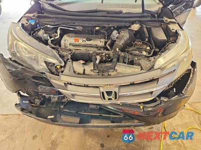 Zdjęcie 12 z 13 samochodu: 2014 HONDA CR-V EXL VIN:2HKRM4H75EH627971 - miniatura