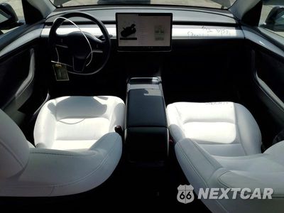 Zdjęcie 8 z 12 samochodu: 2023 TESLA MODEL Y VIN:7SAYGDEE0PF882439 - miniatura