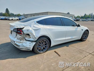 Trzecie zdjęcie samochodu z tyłu: 2020 TESLA MODEL 3 VIN:5YJ3E1EA8LF703227 - miniatura