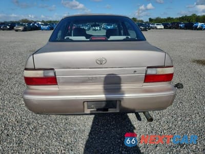 Zdjęcie 6 z 12 samochodu: 1994 TOYOTA COROLLA DX VIN:1NXAE09B2RZ193165 - miniatura