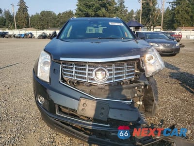 Piąte zdjęcie samochodu w środku: 2014 CADILLAC SRX PERFORMANCE COLLECTION VIN:3GYFNFE3XES609477 - miniatura